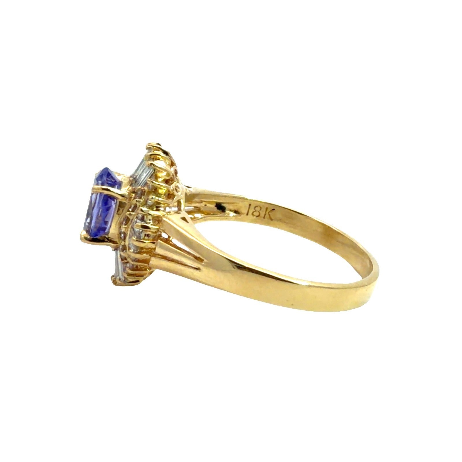 18k Yellow Gold Ring with 0.90 ctw Oval Tanzanite and 0.60ctw Diamonds Size 6.750